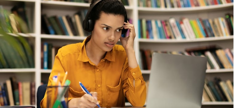 over the phone interpreter listening intently to a call