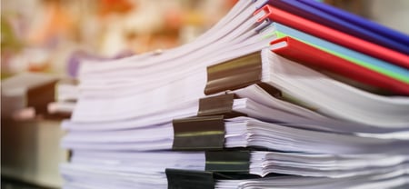 stacks of educational documents