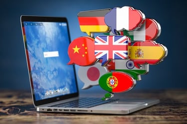 laptop with floating speech bubbles of flags to represent website content localization