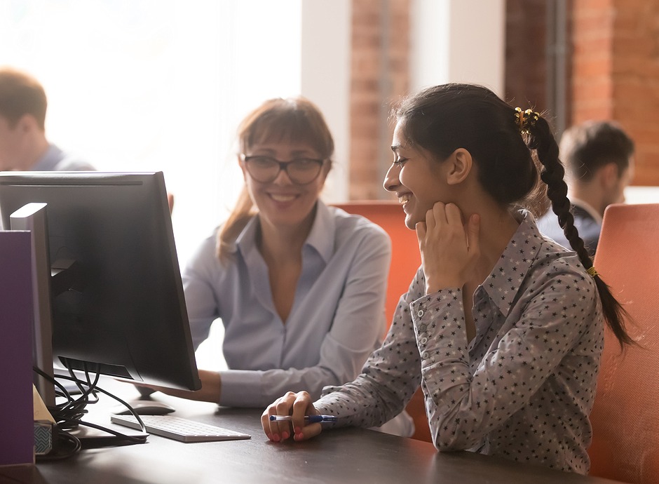 team members sitting at desks