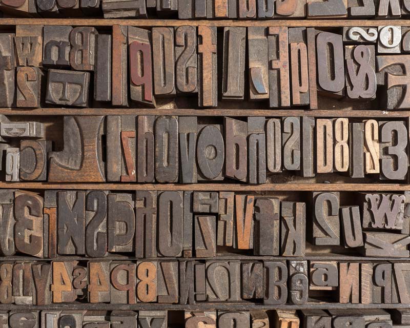 Wooden alphabet letters on wall