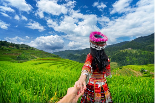 hmong woman holding hands